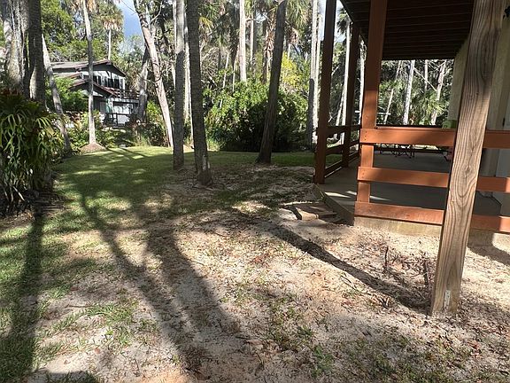 Large covered patio for BBQ's and relaxing.