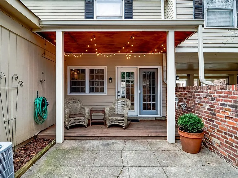 private patio and covered porch, looking toward door to kitchen