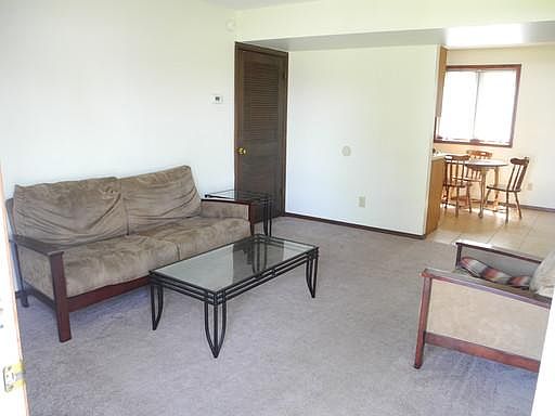 Living room with ample seating and room for your electronics