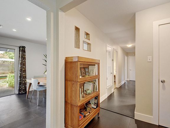 dining to the left, looking down hall to bedrooms