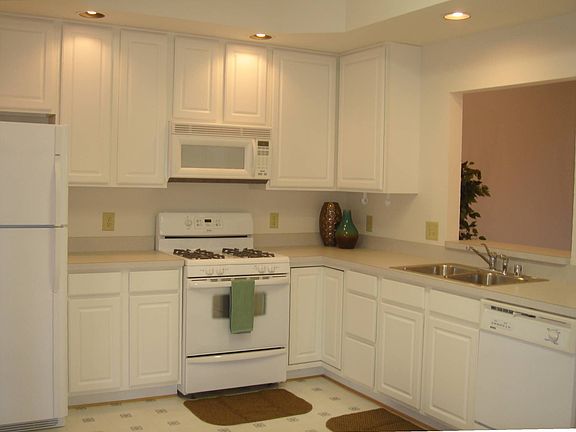 Tray Ceilings, Lots of Overhead Lighting.  Bright & Airy!