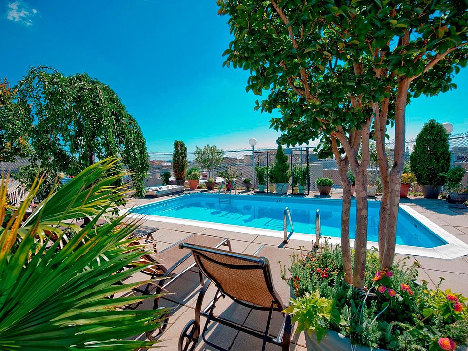 Relax on a chaise among the lush plants on the Palladium's exclusive rooftop.