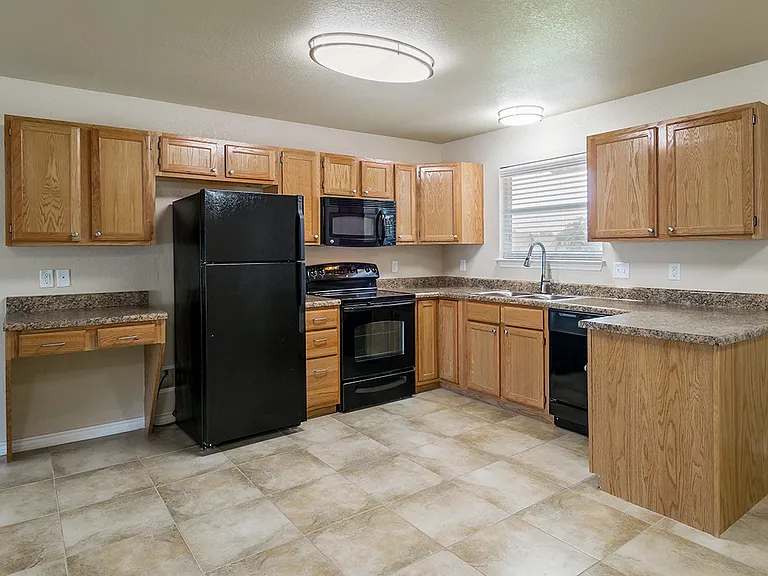 Kitchen in a Phase 2 apartment home at Gardens of DeCordova