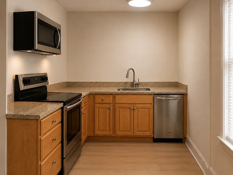 Full size kitchen with stainless steel appliances and dishwasher.