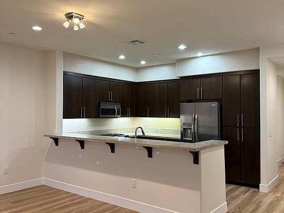 2nd image of 4820 Bellflower Ave #207