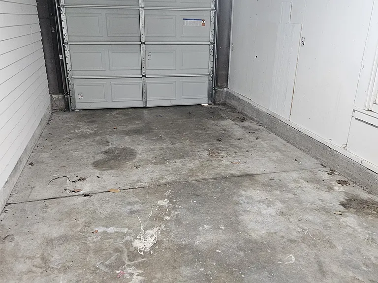 garage from utility room door, showing automatic door system