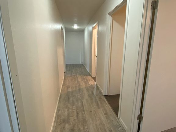 Wide hallway to bedrooms