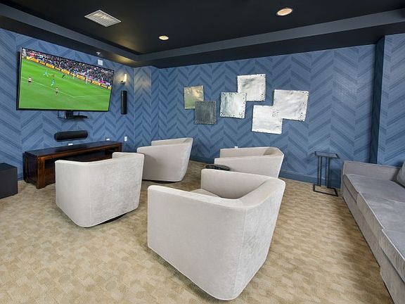 Watch the game or a movie with friends in the theater room
