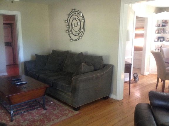 Living Room w view into dining w corner cabinet