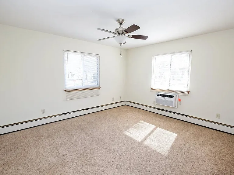 Welcome to Central Lakes of Uptown, where spacious living meets comfort. This bright, airy room features large windows for natural light and a ceiling fan for your convenience. Don't miss your chance to make this space your ownschedule a tour today!