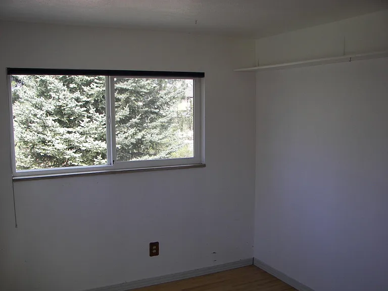 West view in kids bedroom looking west, Upper shelves aroun