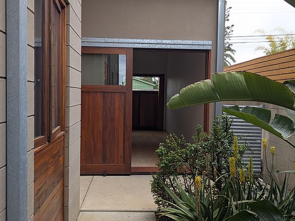 Walkway to front sliding door, door open