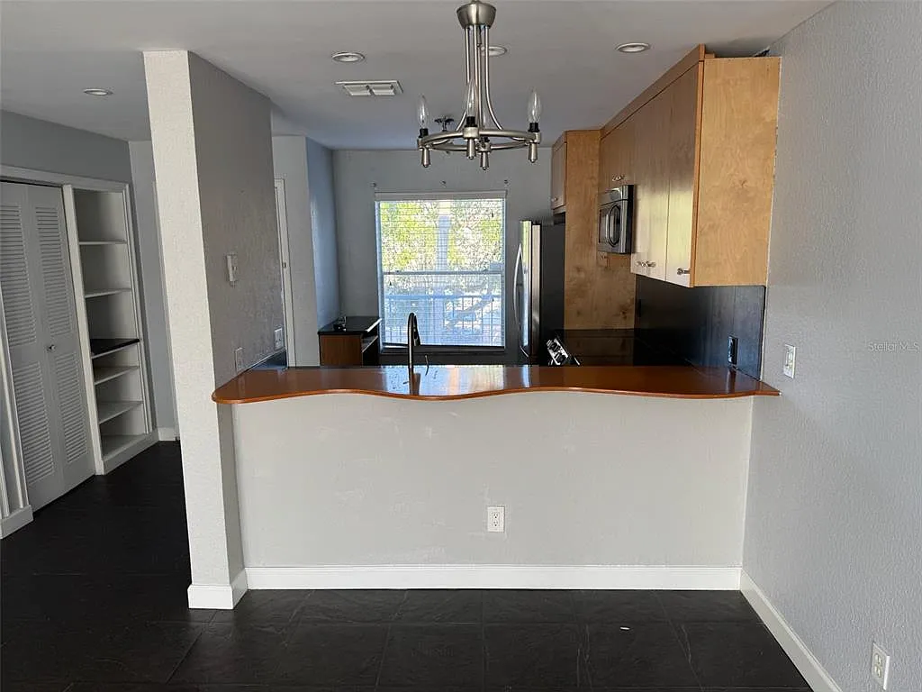 Building Photo - 2568 Woodgate Blvd #205
