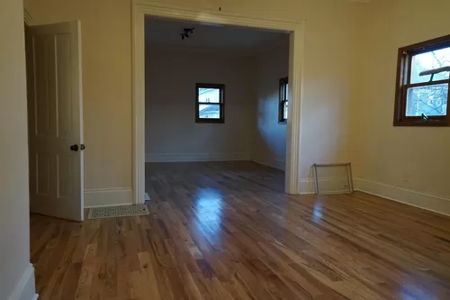 Large dining room looking to living room Just installed All new Solid Oak FlooringThroughout entire Appartment no Luxury cheep flooring here - N Court St