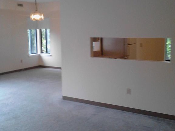 Dining room and view into kitchen