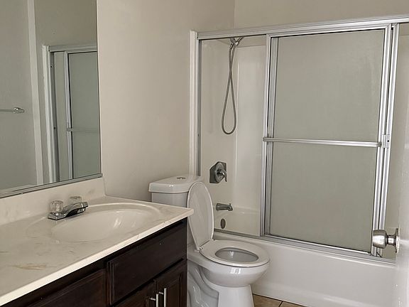 New marble counter, flooring and baseboards. Bathroom tub has been resurfaced and new hardware on cabinets and shower head.