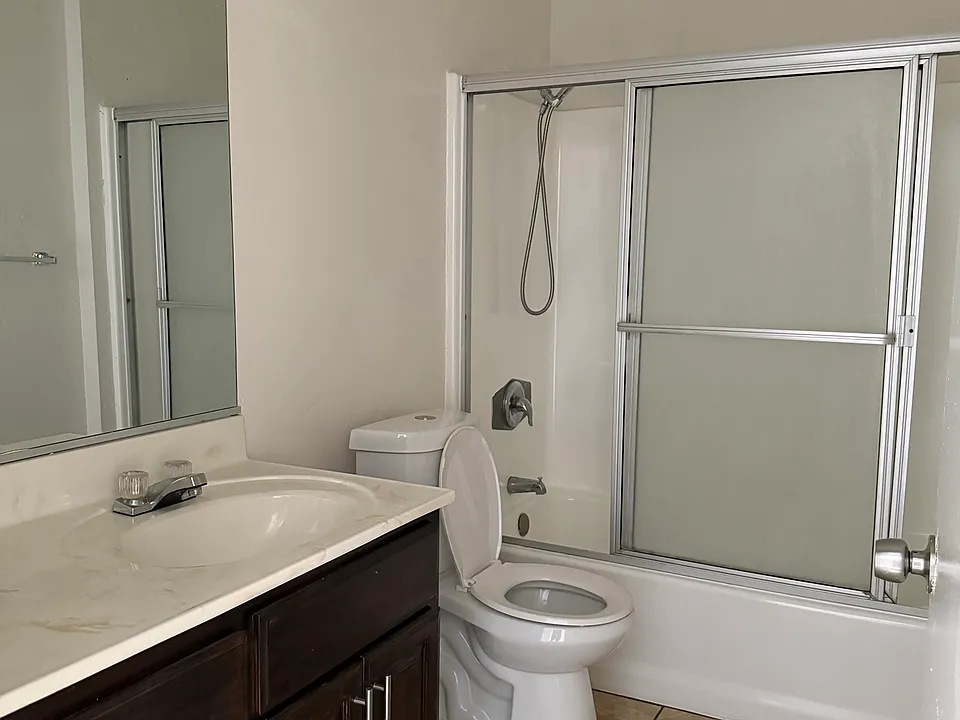 New marble counter, flooring and baseboards. Bathroom tub has been resurfaced and new hardware on cabinets and shower head.