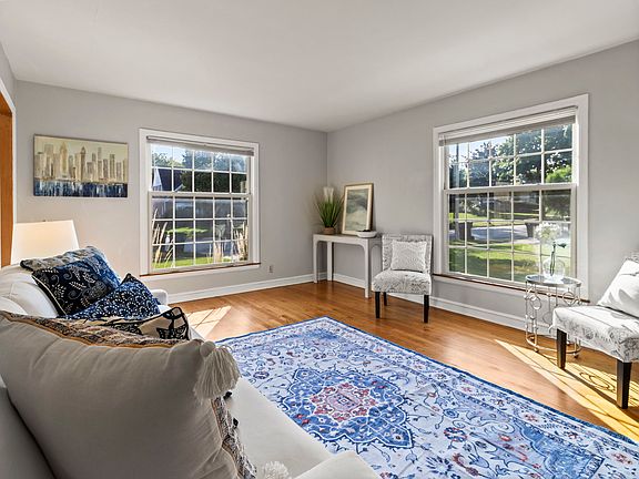 Huge windows and hardwood floors