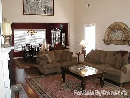 Den/Dining Room
						:
						view from entry, open floor plan, great for entertaining