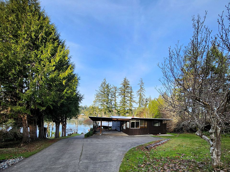 Welcome Home. This mid century charmer is set amongst the trees and Hammersley Inlet.