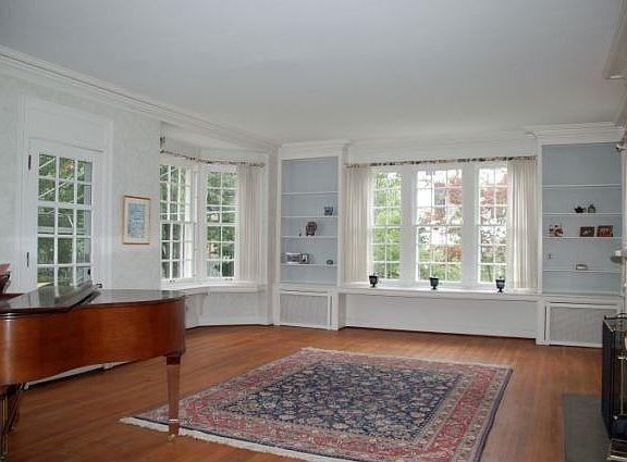 Step down living room with elegant touches and detailing