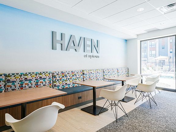 Our modern work-from-home space offers comfortable seating and a productive environment for residents to focus and connect.