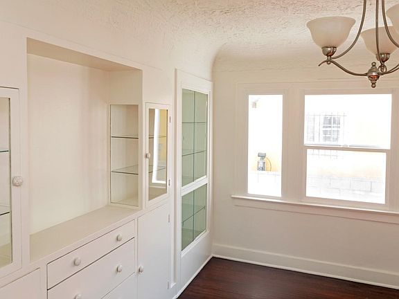 beautifully restored cabinet in dining room