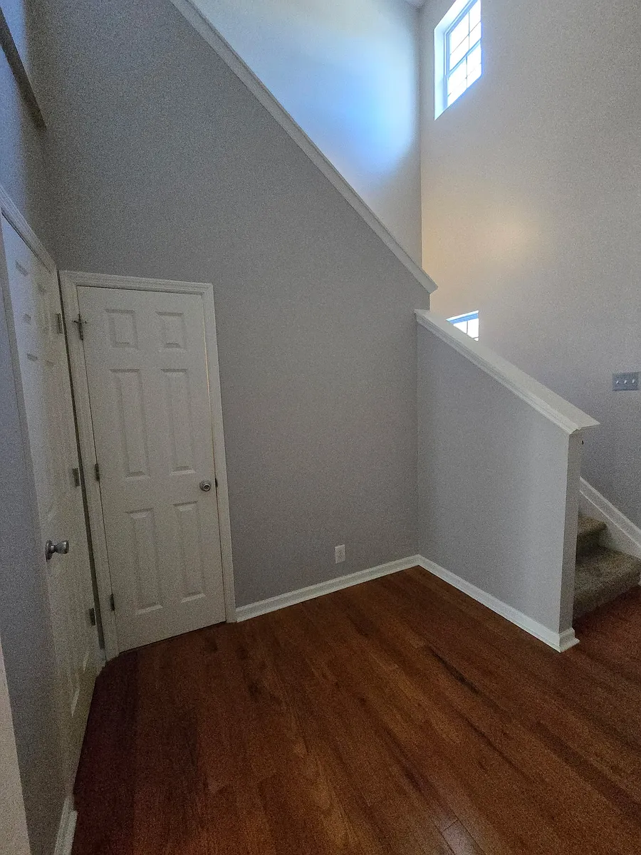 Foyer, door to half bath and coat closet - 638 Pippin Dr #638