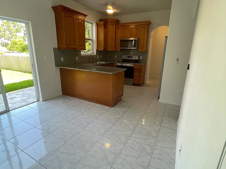 Formal dining room with access to the patio