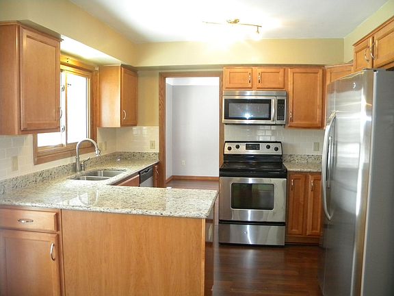 Fabulous renovated kitchen w/ new cabinets, flooring, granite counters & more