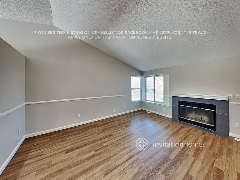 4861 S Dunkirk Way — Photo 2