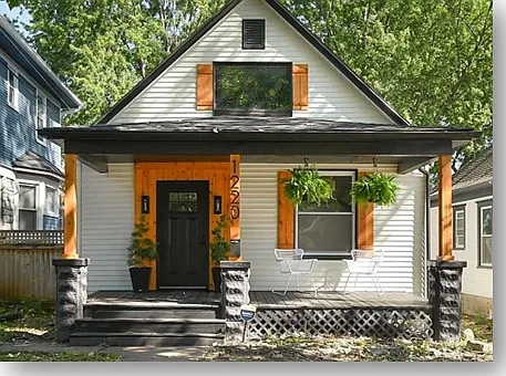Adorable front deck on quiet street.