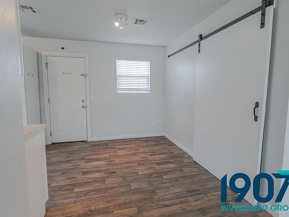 Entry with kitchen on left.