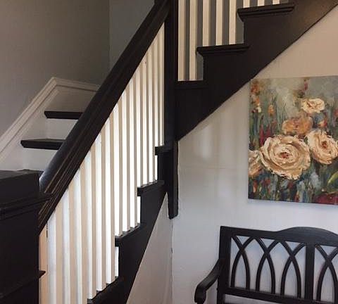 Shared lockable entry, stairs to apartment.