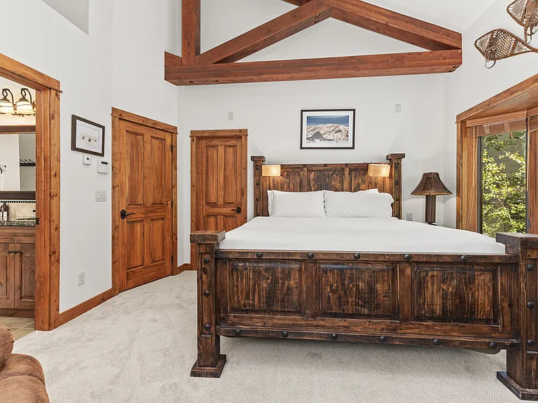 Top Level - Ensuite King Bedroom 1 with Bathroom Entrance in Photo