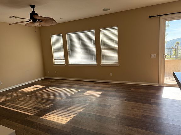 Living room Nice open space, lots of light also shows patio door on right