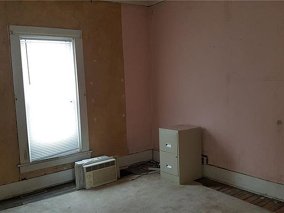 South rear room(bedroom) with bath off kitchen
