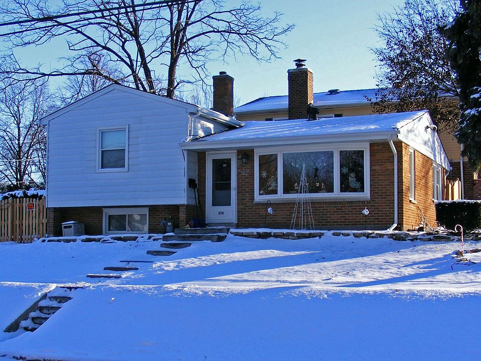 High on corner lot sits 320 E. Logan