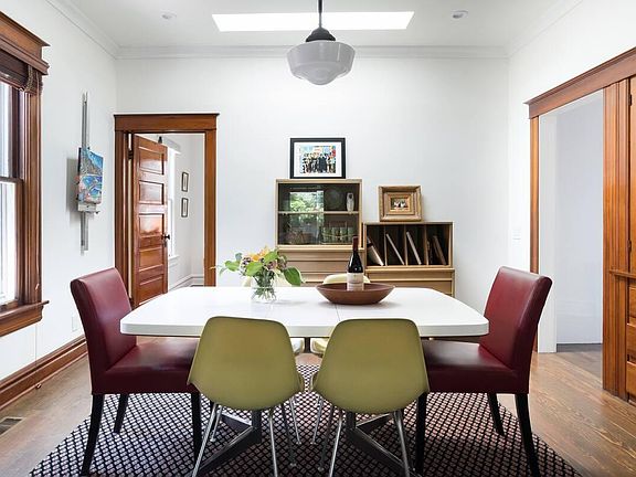 Dining Room with view of bedroom on left and kitchen on right