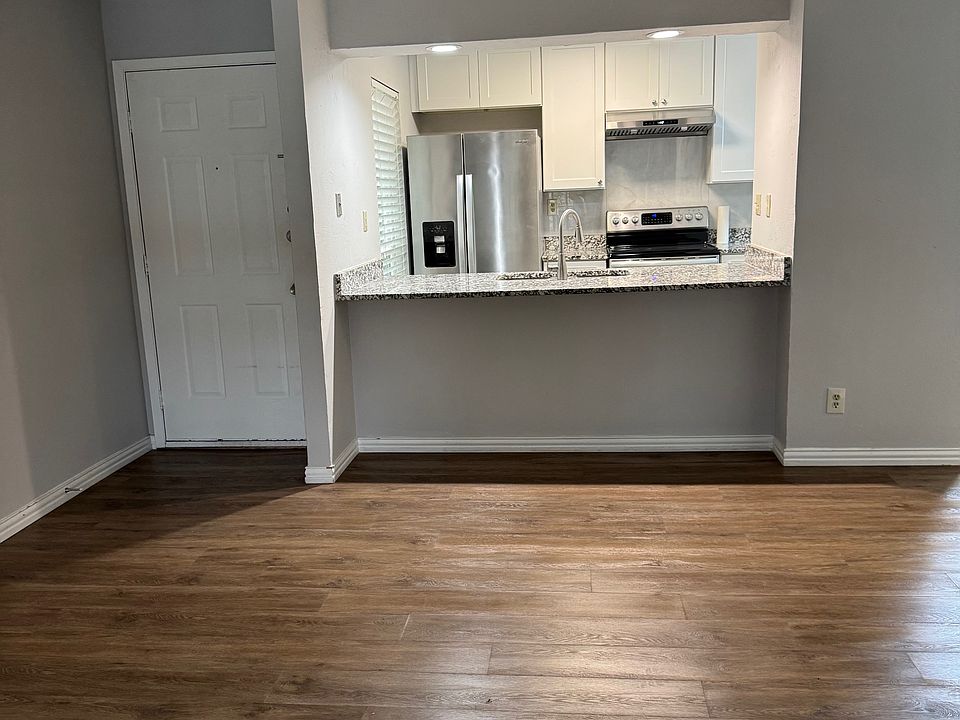 View toward Kitchen from far side of Living Room
