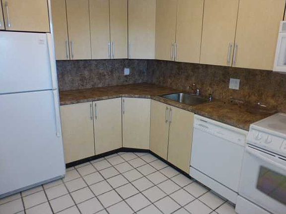 2nd image of 3351 S Palm Aire Dr APT 308
