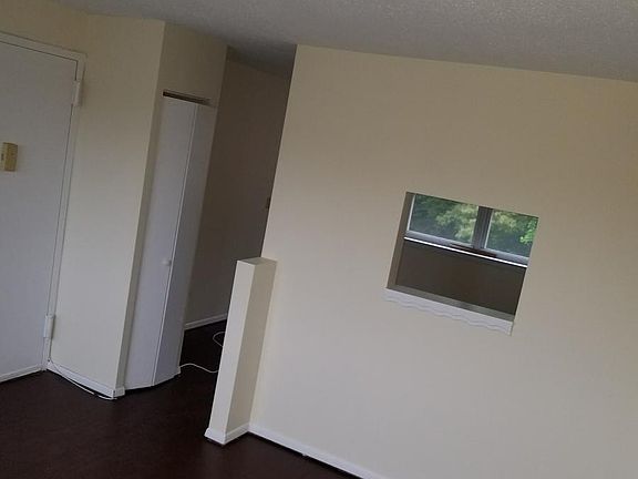 Living room looking into kitchen