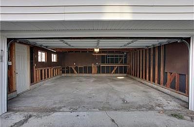 Lots of overhead storage and room for two cars with auto door opener