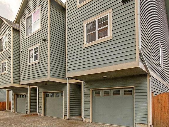 Unit is on the far left in this view from the driveway