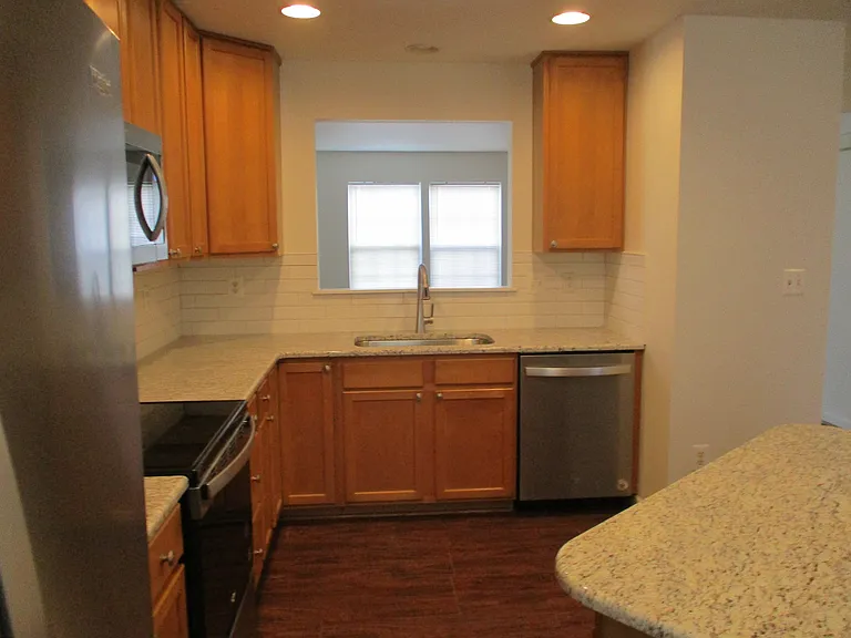 View of kitchen towards living room