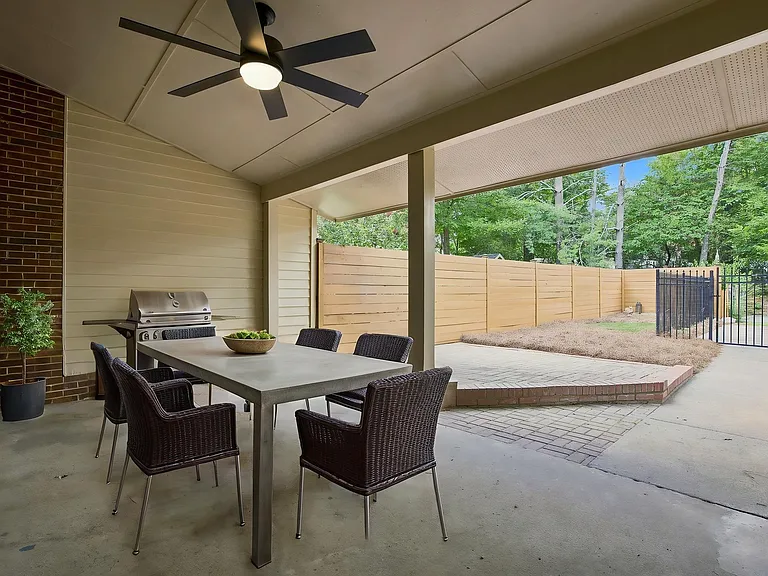 Covered Back Patio with Attached Extra Storage Room