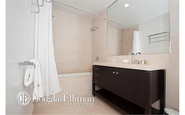 Sold by Douglas Elliman | media 12