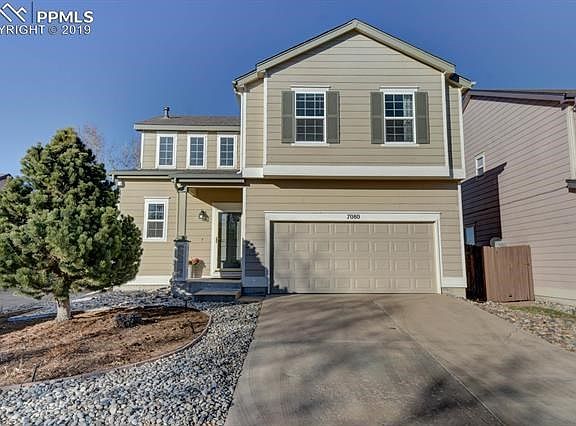 Welcome home for the holidays to 7080 Mountain Creek Grove!