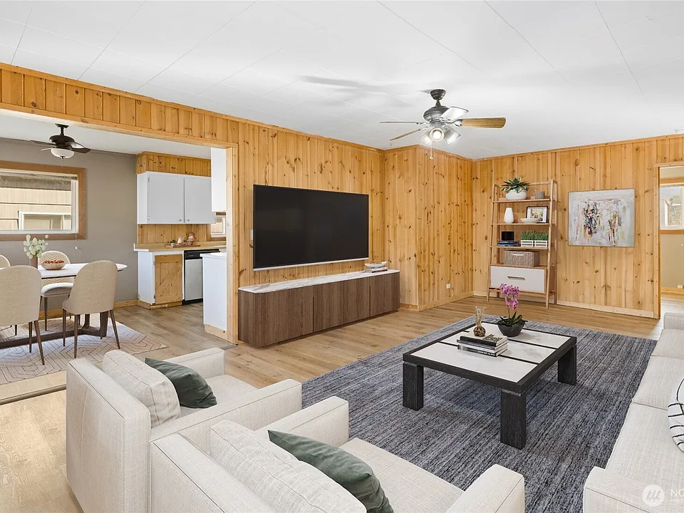 Virtually staged living room.>