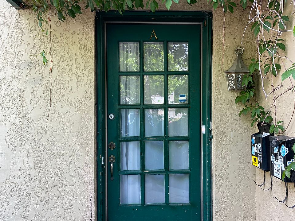 Front entry door leading into common living space. (Patio space for a table and chairs does not show in this photo unfortunately.)